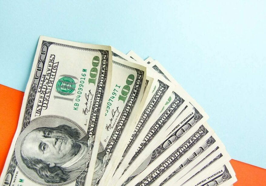 fanned out hundred dollar bills